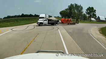 Tractor-trailer ignores stop sign and collides with semi-truck in dramatic intersection crash