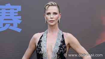 Charlize Theron looks incredible in a plunging black statement gown and fringed gold number as she joins Matt Damon at The Odyssey premiere in China