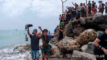 Ceuta chaos as thousands cross into Spanish territory amid 'national emergency' plea