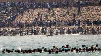 'Absolute chaos' as thousands of Moroccan migrants breach Spain's Ceuta border