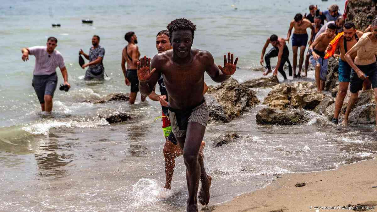 Menschen stürmen spanische Exklave Ceuta – Madrid schickt seine Armee