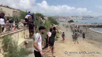 Thousands breach Morocco’s border into Spain