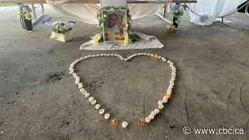 'Love you forever:' Family, friends of Hamilton boy, Nathanael Selambi, hold vigil where he died