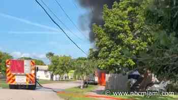 1 hospitalized after county trucks catch fire in SW Miami-Dade