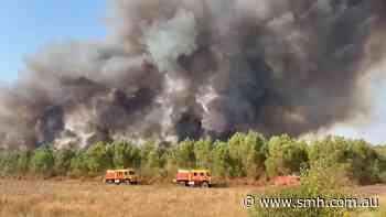 French firefighters continue to battles blazes in dry forests west of Bordeaux
