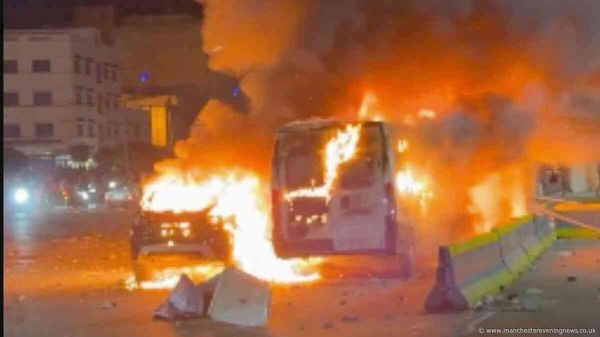 Riots break out with cars on fire after thousands of migrants cross Spain-Morocco border