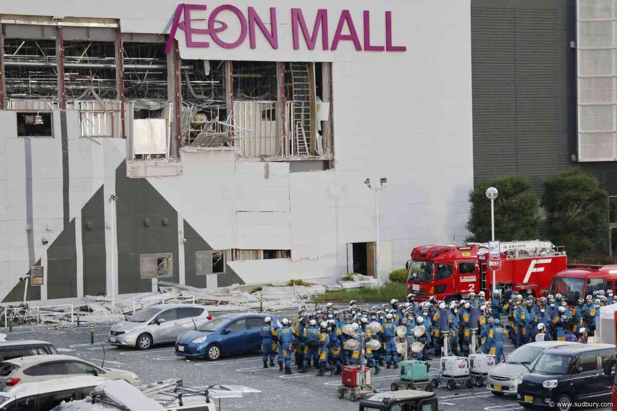 Death toll from southwestern Japan quake climbs to 34 as rescuers again search damaged mall