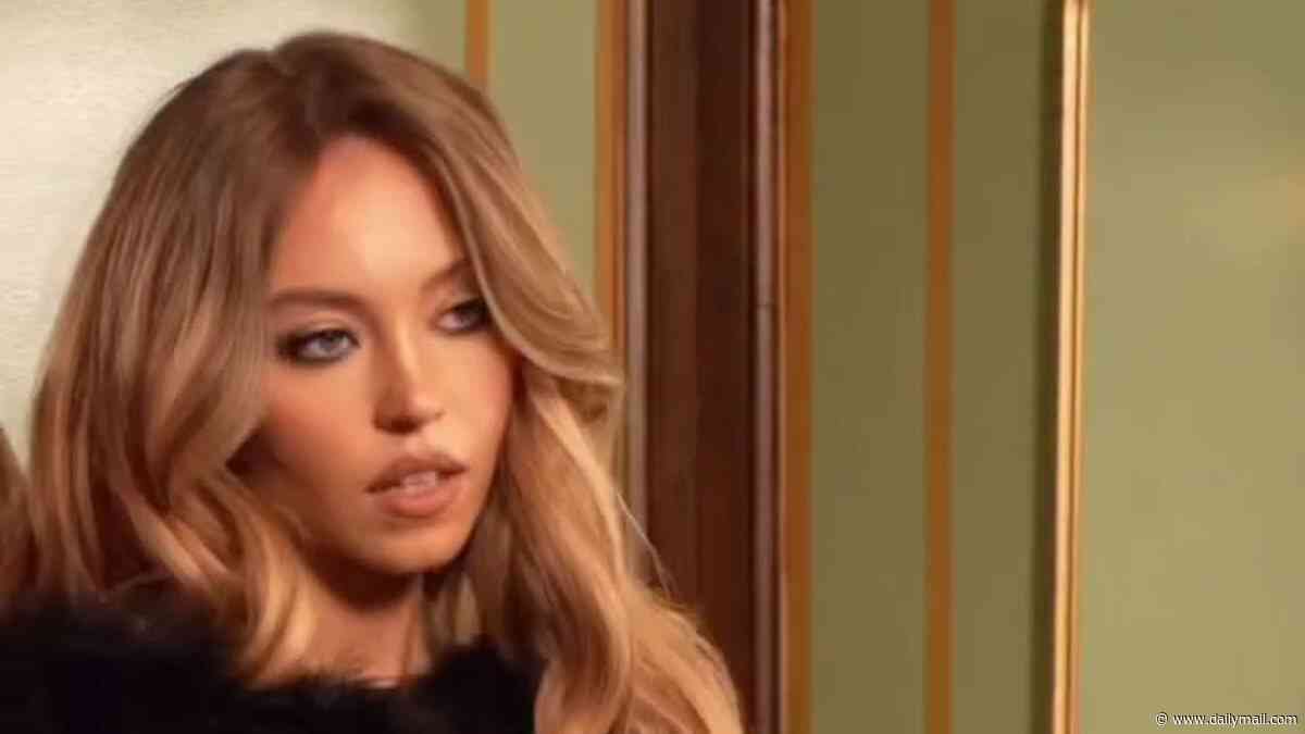 Sydney Sweeney turns up the heat as she models lacy bra, thong and suspenders for her SYRN lingerie label
