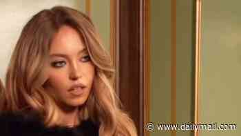 Sydney Sweeney turns up the heat as she models lacy bra, thong and suspenders for her SYRN lingerie label