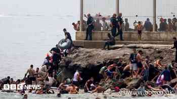 Spain sending troops as thousands enter enclave of Ceuta from Morocco