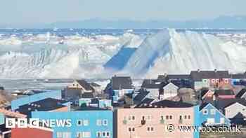 Watch: Giant iceberg turns over near  Greenland's coast