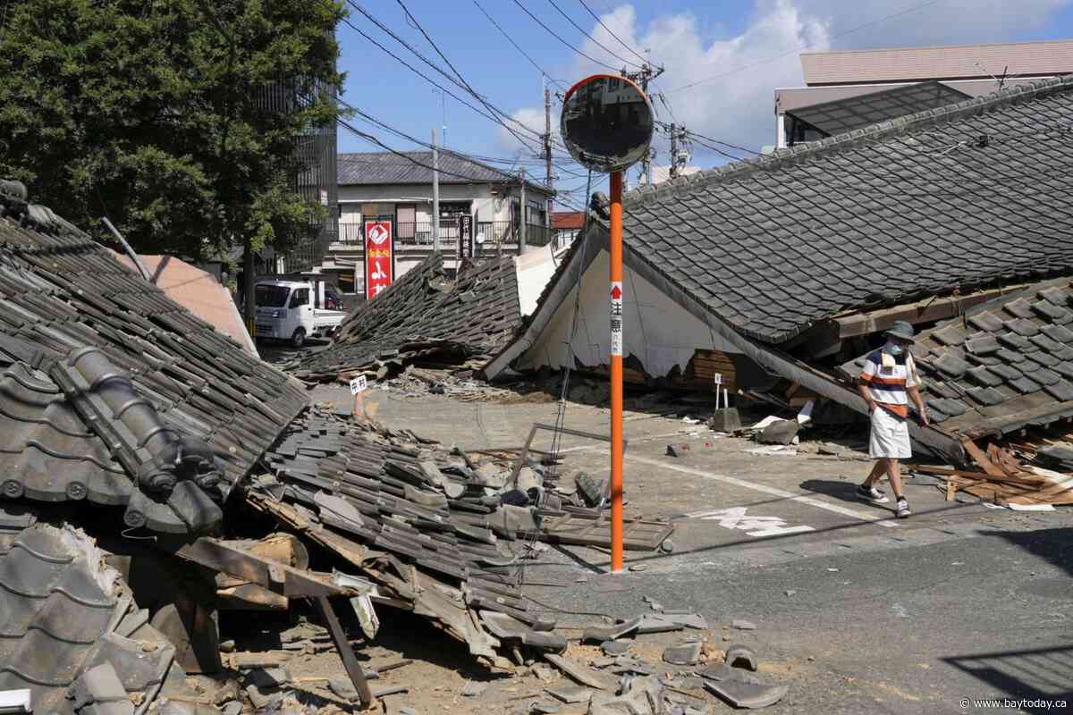 Quake survivors in southwestern Japan sleep in cars in sweltering heat as death toll rises to 34