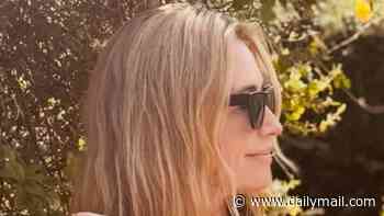 Cat Deeley shows off her gardening skills by mowing the lawn in her bikini after her intimate date with movie executive