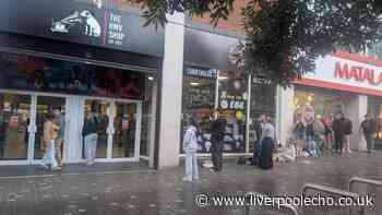 Fans brave the elements for special Ariana Grande items at HMV Liverpool