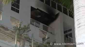Crews battle fire on balcony at high-rise building in Edgewater