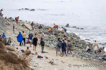Spain’s PM blames trafficking gangs as 60,000 cross into Ceuta from Morocco, with 34 deaths
