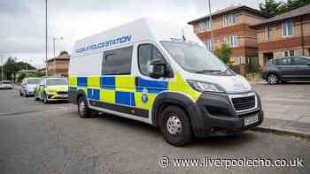 Eight men charged after hundreds of police officers raid homes across Merseyside