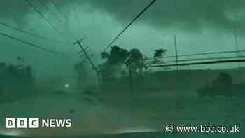 Dashcam captures tornado toppling power lines onto car