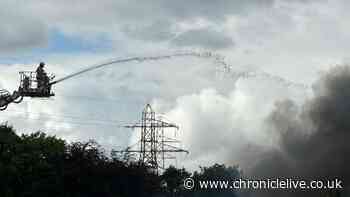 Huge Washington factory fire leads to 'high volume' of emergency calls as smoke seen for miles