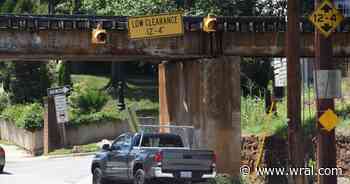 Conflicting height measurements raise questions after Peace Street bridge crashes