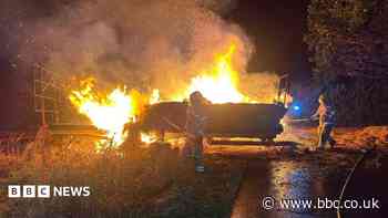 Fire crews and farmers battle trailer blaze