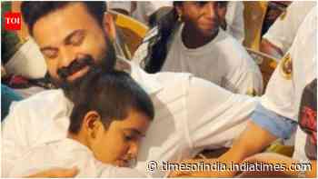 Young fan hugs and kisses Kunchacko Boban