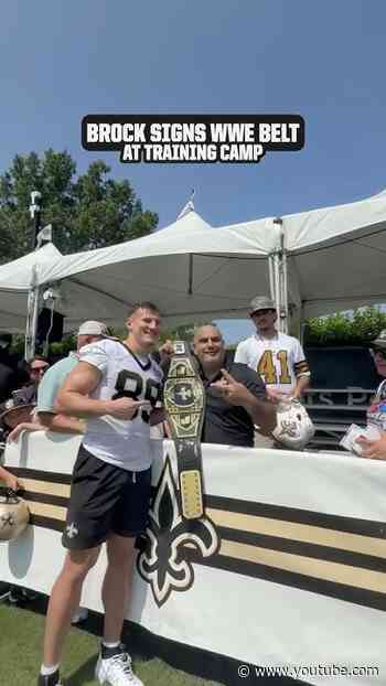 Brock Rechsteiner signs Saints WWE Championship belt at training camp #saints #nfl