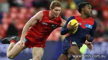 Young Bomber suffers concussion in friendly fire clash; Demons grind out win on Gold Coast; Tigers off the bottom