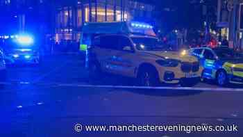 Huge emergency services response on Deansgate as man rushed to hospital