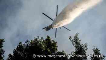 Two helicopters collide in Greece battling wildfires as search and rescue launched