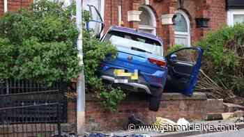 Man fighting for life after car ploughs into North East home with driver arrested