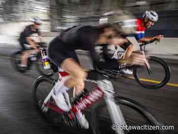 Determined Ironman Canada-Ottawa athletes power through soggy conditions