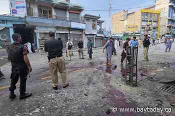A suicide bomber strikes an antimilitant rally in northwestern Pakistan, killing at least 14