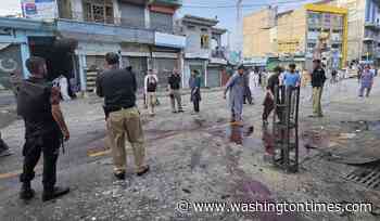 A suicide bomber strikes an anti-militant rally in northwestern Pakistan, killing at least 14