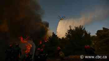 2 killed after helicopters battling Greece wildfires collide