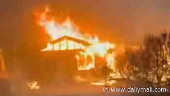 Catastrophic fast-moving fire tears through Spokane as thousands flee their homes and 4,000 buildings to be razed to the ground