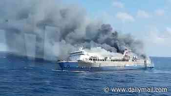 At least five dead and dozens missing after ferry carrying 100s catches fire in Indonesia