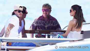 Sad twist in Beckham family feud as Brooklyn and wife Nicola enjoy South of France holiday with his godfather Elton John... while his estranged parents David and Victoria relax on their yacht just miles away