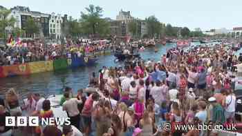 Crowds line Amsterdam's canals for Pride boat parade