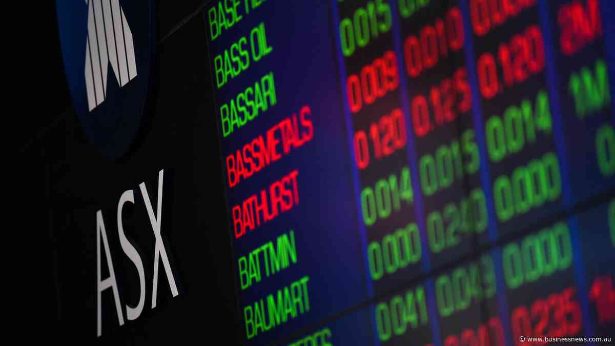 Aussie shares edge higher as iron ore tumbles