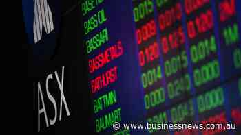 Aussie shares edge higher as iron ore tumbles