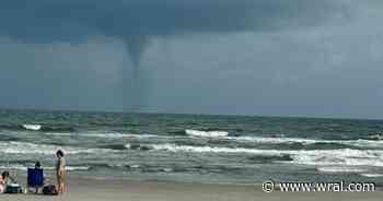 Beachgoers spot waterspout off Sunset Beach's coast