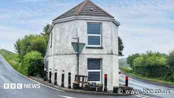 Former toll house with links to historical riots sells at auction