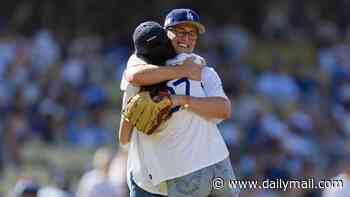 Dodgers pay emotional tribute to Rob Reiner as his children Jake and Romy throw out first pitch... while other son Nick awaits murder trial in prison hellhole
