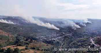 Major incident declared and people asked to stay indoors as flames continue to burn on Rhondda mountain