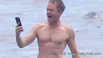 Super fit at 53! How I Met Your Mother star Neil Patrick Harris sizzles as he shows off sculpted abs during family day at sea on board Elton John's yacht