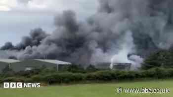 Firefighters spend second night tackling blaze at landfill site
