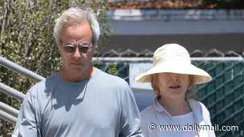 '80s actress who worked with Sean Connery seen on rare outing with actor husband... can you guess who they are?