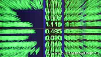Australian shares surge as banks, miners charge higher