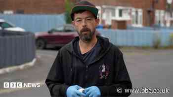 'Minion Man' paints over estate's obscene graffiti